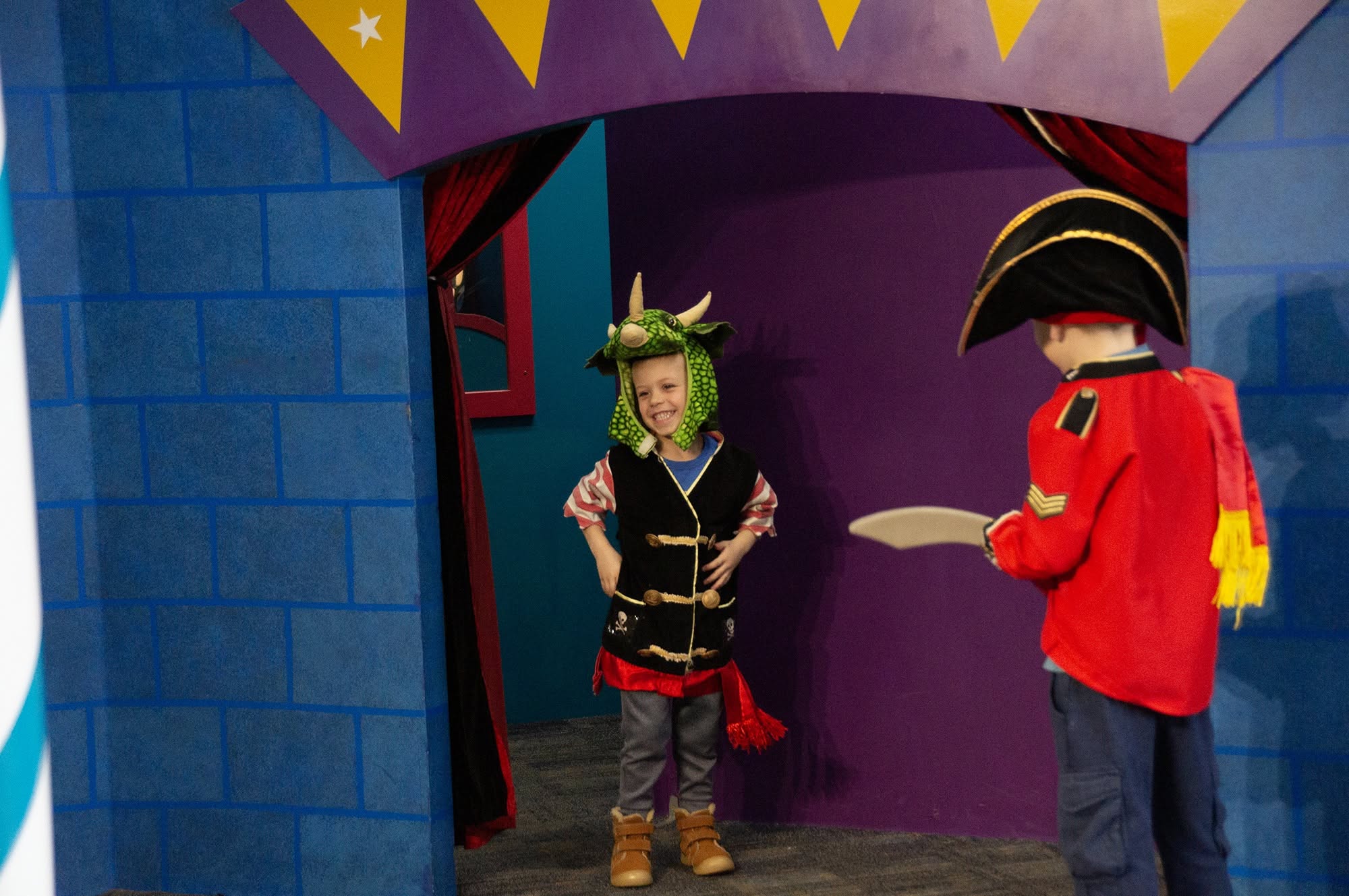 Kid dressed up as Dragon