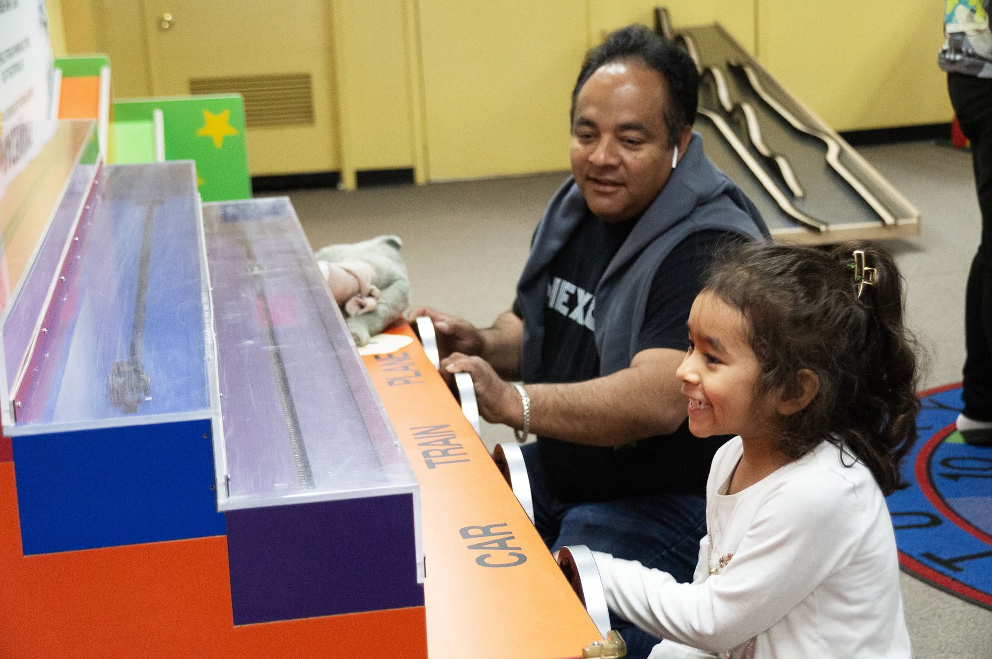 Dad with Kid at How Things Work