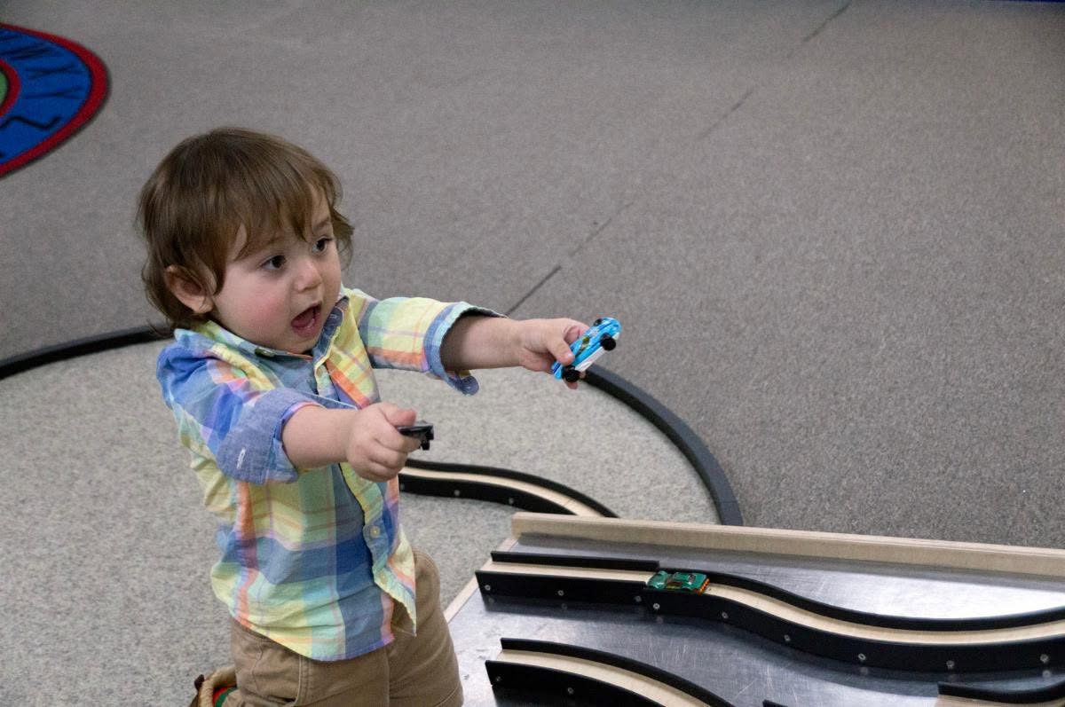 Kid excited by cars
